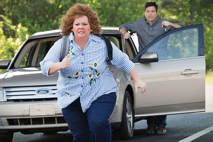 Melissa McCarthy may not be able to escape this movie, but that doesn’t mean you can’t. Jason Bateman’s in the back, cheering on the idea of escape.