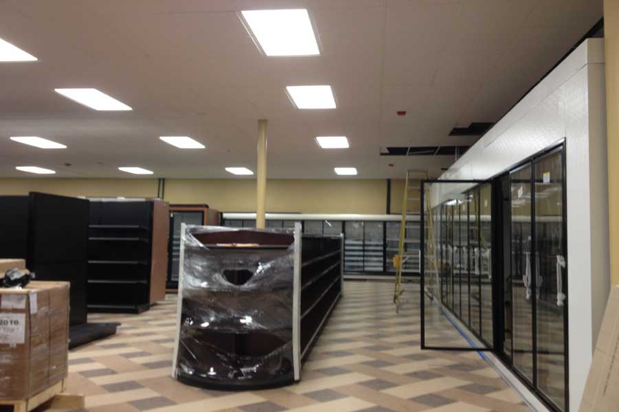 Shelves and freezers await stocking in Johnson's Sterling Market. The old Grand Union space has been gutted and rebuilt.