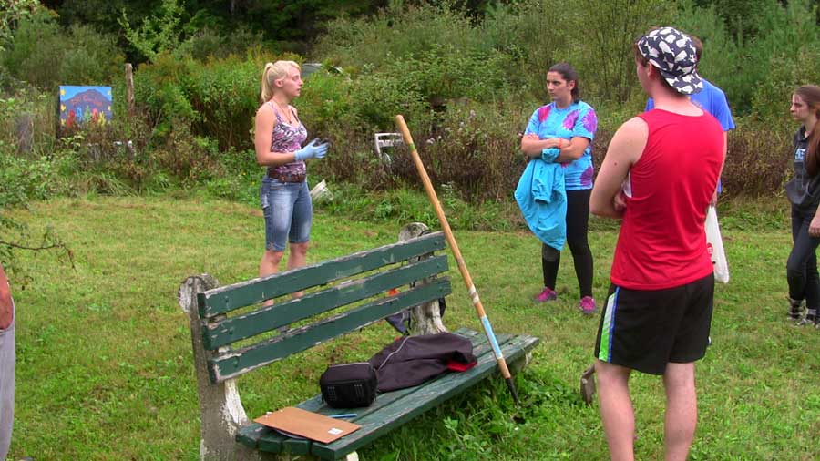 Volunteers get ready to work on revitalizing the community garden.