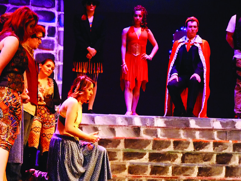 A peasant (Danielle Godjikian) makes an appeal in the JSC production of “Pippin”