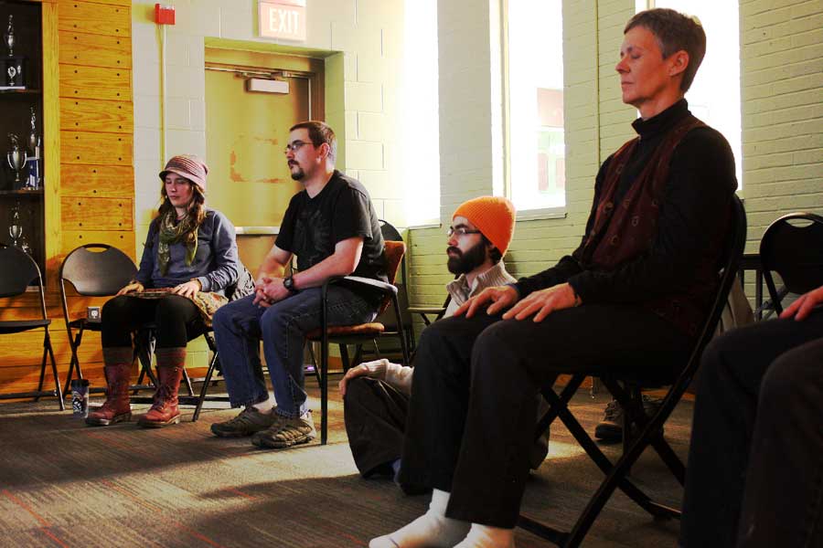 At the first meditation session in the SHAPE function room on Jan. 30, students and faculty focus on their thoughts.