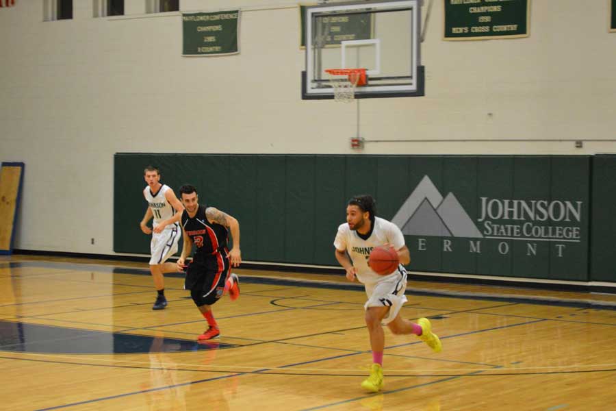 Ron Adrian heading down the court