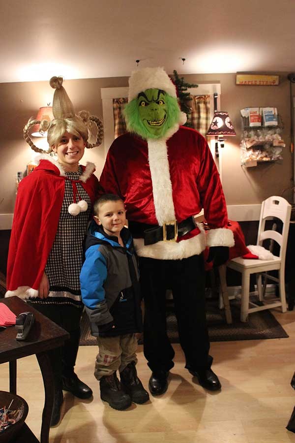 The Grinch and Cindy Lou Who greeted people at Maple Addictions