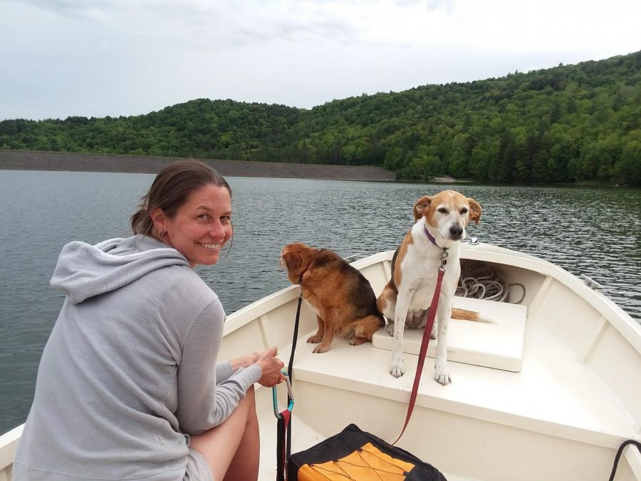 Emily Tarleton enjoying some time out boating with her doggos.