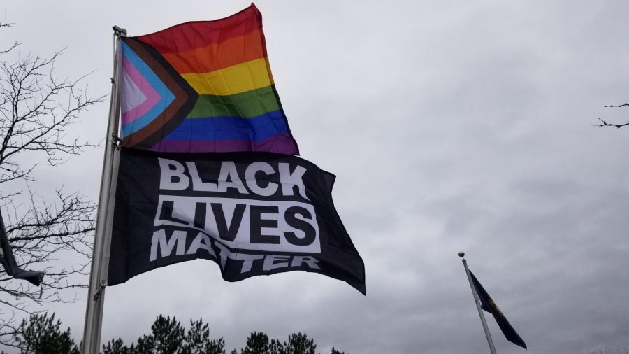 The+Progress+Pride+and+Black+Lives+Matter+flags+flying+above+the+quad