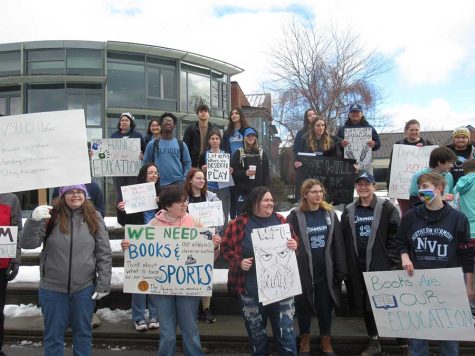 Students gather with placards before  VTSU President Parwinder Grewal’s Valentine’s Day visit
