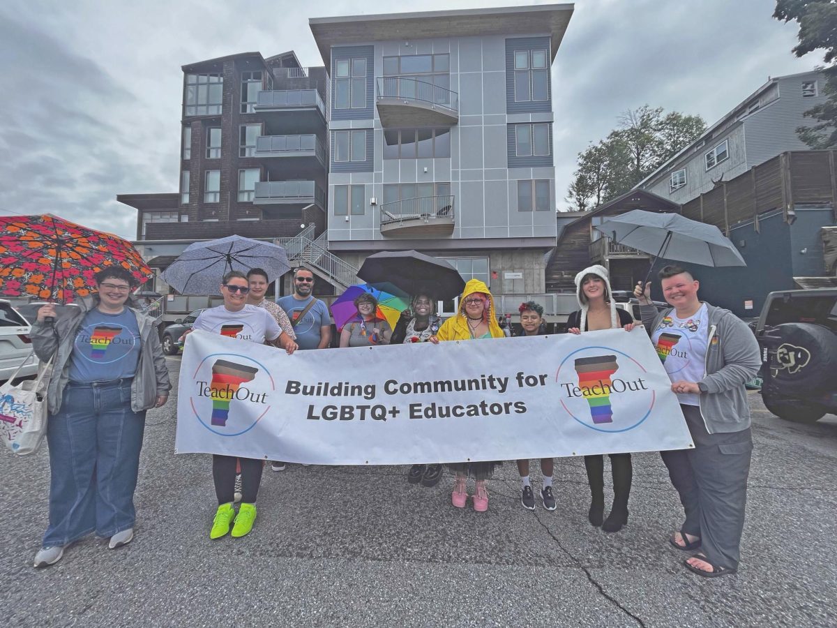 Unity standing with Teach-Out at the 2023 Burlington Pride Parade