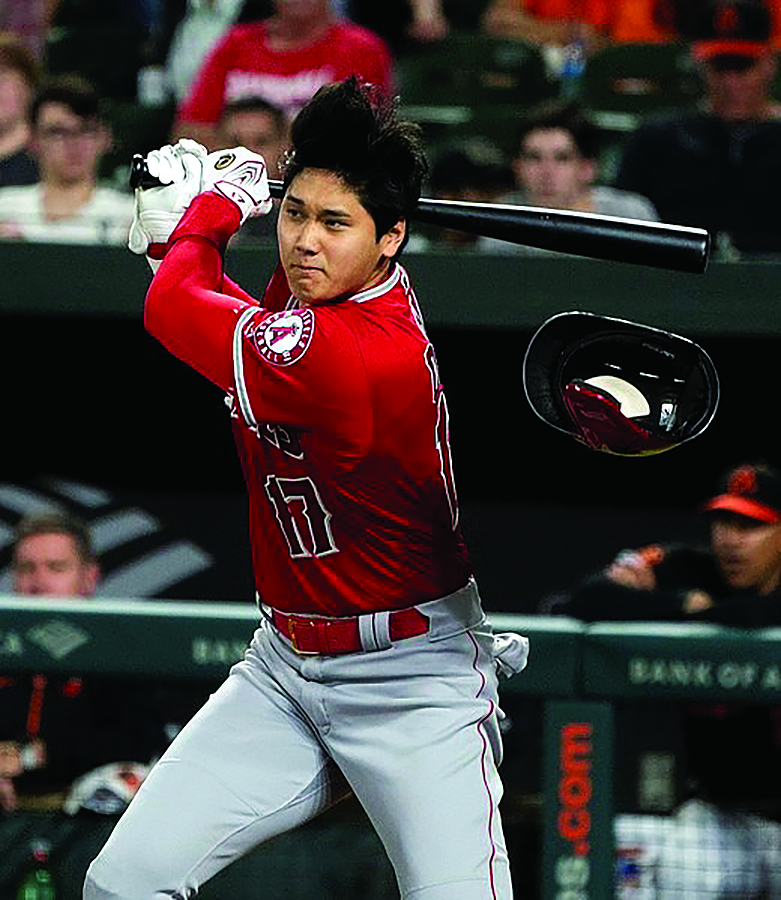 Shohei Ohtani on May 10, 2019 in Baltimore, while he was playing for the LA Angels. In a hair-raising development, the “double threat” hitter/pitcher is currently embroiled in a gambling scandal threatening to tarnish his legacy. 
Photo licensed under: Creative Commons Attribution - Share Alike 2.0 Generic
